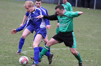 Philip Traynor makes another attack for Kilmore Rec against the Malachians. 