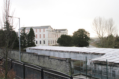 The old Downe Hospital in Downpatrick with theformer St John's residential Home in the foreground which was destroyed in 2012 in an arson attack. 