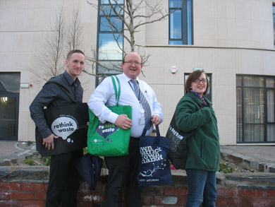 Barry Treacy, Joe Parkes and Lucinda White show off the reusable bags that Down District Council are giving away to shoppers.