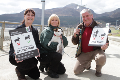 Councillors Carmel O'Boyle and Eamon O'Neill with Down District Council dog warden have launched the new rules about looking after your dog on Newcastle promenade and beaches.