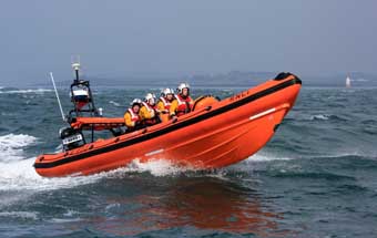 The Portaferry Blue Peter 5 Atlantic 85 class RIB in action rescued four people when a yacht struck rocks. 