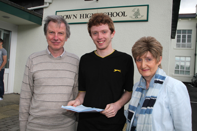 Jamie Harris, Down High School pupil from Saintfield,  pictured with his parents Micael and Jane, is set to study Computer Science at Cambridge after gaining 4 A* and 1 A.