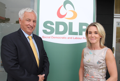 Seán Rogers MLA picture dwith Newcastle constituency office manager Laura Devlin at the launch of the new office. 
