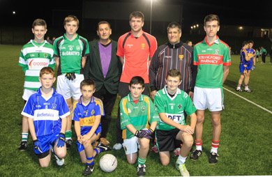 Some of the young players from East Down GAA clubs at teh opening night of the gaelic football initiative at St Patrick's Grammar School 3G pitches with Cllr Wiliie Clarke, PCSP Chairman, Peter Turley, Down senior player, and Sean McCashin, East Gown GAA chairman.