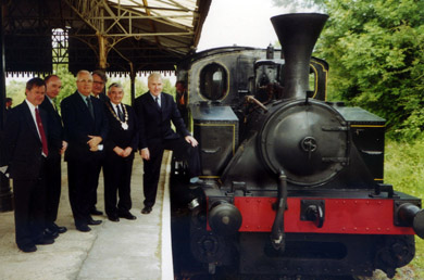 Eddie McGrady, third left, on the platform at Downpatrick rainway station.