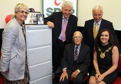 Eddie McGrady  seated centre, pictured with party colleagues South Down MP Margaret Ritchie, party leader Alasdair McDonnell, Seán Rogers MLA and Down District Council Chairperson Cllr Marie McCarthy diring the official opening of the Newcastle constituency branch this summer. 