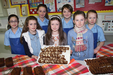 Pupils in the Domestic Science class show off their delicious gingerbread.