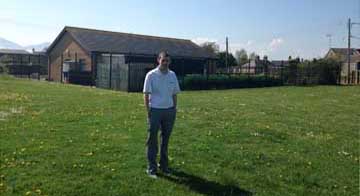 Stephen Burns pictured at the area of Ballykinler where the new play park is to be built.