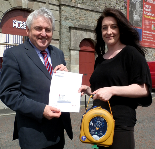 Downpatrick Lions President Brenbdan with Anne Kelly of Down County Museum.