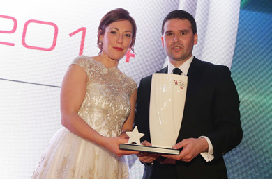 David Healy with his Hall of Fame Award presented by Joanne Hayden, Sales and Marketing Manager of  Linwoods, sponsor of the Belfast Telegraph Sports Awards 2014.