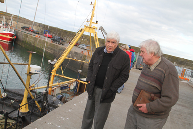 Newry Mourne and Downe District Councillor Dermot Curran at the harbour in Ardglass with NIFPO Chief Executive Dick James.