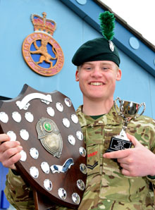 Sharpshooter Adam Smith with his prizes.