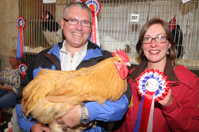 Ally Whan, Poultry Organiser, with David Neill with his Prize Winner Buff Orpington, heavy soft feather.
