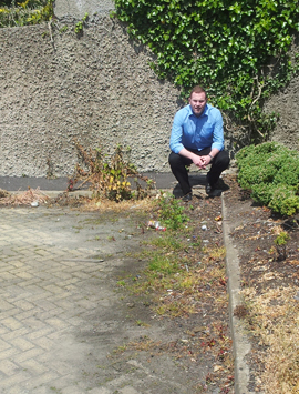 Chris Hazzard MLA (Sinn Fx8ein) looks over the Castlecourt area of Killough.