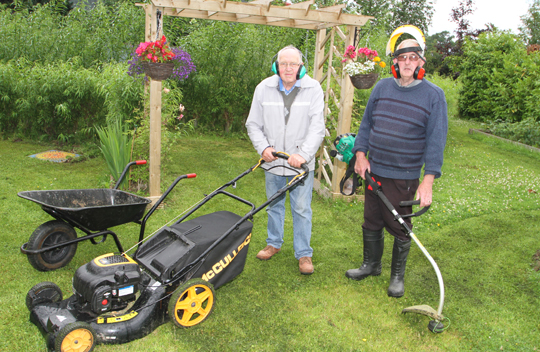 Shedders Barney Graham and Raymond Higgins get the garden into shape.