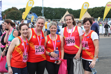 L to R Niamh Kellett, Janine Murray, Mags Flynn, Cheryl Denvir and Lisa Milligan happily posing after Sunday’s Belfast Half marathon