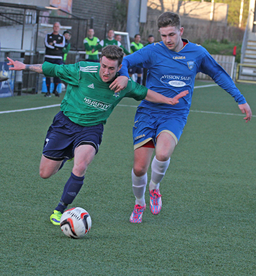 Barry Treacy battles with Lisburn Rangers defender