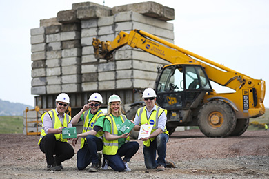 Cathal O’Hare, Niall Doyle and Jonathan Connolly from the Newry construction company, O’Hare and McGovern, join Macmillan Fundraising Manager, Maria Small, to support the leading cancer charity’s men’s health awareness campaign: Don’t Let Cancer Ruin Your Foundations.