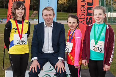 Mini Girls long jump Pictured with Philip Hewitt of firmus energy at Meet 2 of the firmus energy 2016 Super Six series are Lauren Madine (2nd right) from East Down Athletic Club in Downpatrick;  Niamh Fenlon (left) from North Down Athletic Club and Stephanie Bell (right) from Armagh Athletic Club who came first, second and third respectively in the Mini Girls Long Jump. 