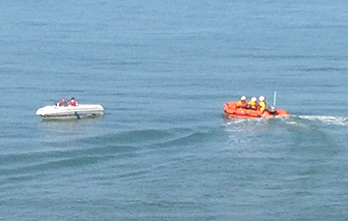 Newcastle RNLI rescue two boaters outside the harbour area in Newcastle. .