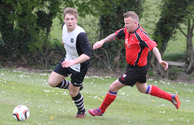 Killyleagh forward Philly Rogan, right, closes in on Dromara defender