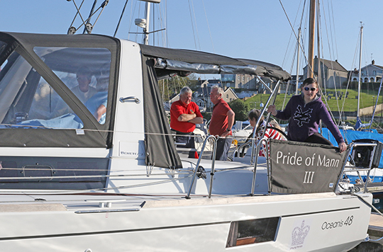 Young Orry from the IOM at the helm of the Pride of Mann III berthed at Ardglass marina.