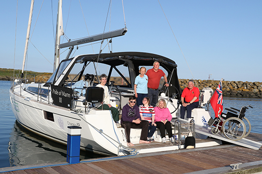 The volunteer crew and members aboard the Pride of Mann III in Ardglass marina.