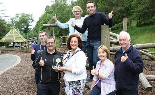Slieve Gullion Forest Park has now been recognised as an Amazing Place for families with young children at the NI4Kids Awards held in Belfast City Hall on 27th June. Chairperson Newry, Mourne and Down District Council Gillian Fitzpatrick presented the NI4Kids Award for Family Visitor Attraction of the Year to Dermot Winters Caretaker of the Park, l-r Patrick Murray Park Attendant, Dermot Winters Caretaker of the Park, Chairperson Councillor Gillian Fitzpatrick, councillor Roisin Mulgrew, Liam Townson Park Attendant, back Councillors Kate Loughran and Pete Byrne.