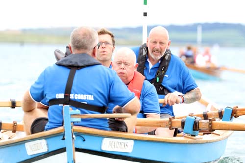 Getting their backs into Skiffie Worlds 2016: the Carrick Coastal Rowing Club from Scotland.