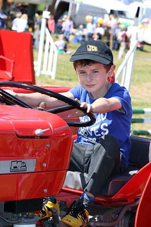 Stefan Hamilton-Mooney from Annalong checks out a Massey Ferguson tractor.