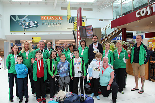 The group returns to Belfast City Airport.