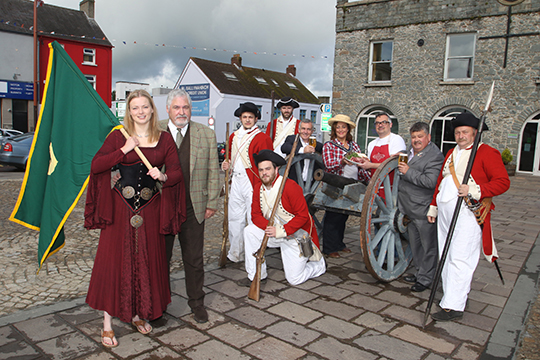 Ingrid Houwers aka Betsy Gray with director of the Ballynahinch Harvest and Country Game and Fine Food Fair, Albert Titterington, with some of the local re-enacters from the 1798 Battle of Ballynahinch.