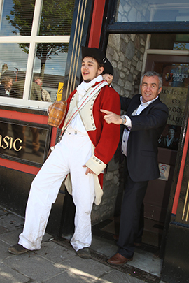 Pub proprietor Mark Murnin ejects a rowdy militiaman who appears to be still celebrating after the Battle of Ballynahinch in 1798!