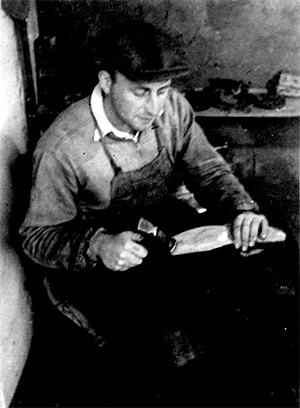 Moshe the cobbler at work in the Jewish Refugee Farm at Millisle. 