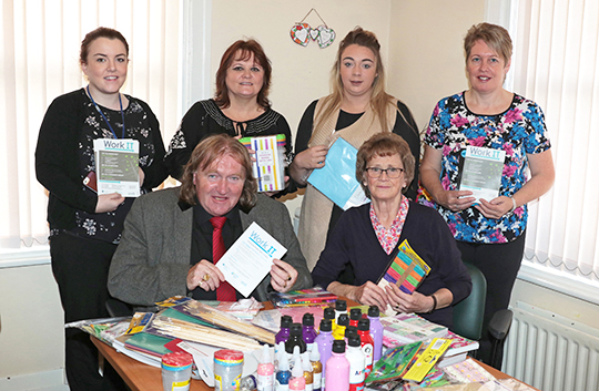 At Age NI centre in Kilkeel were, back row, Laura McGahon, Work IT; Bernadette Donnelly, Age NI Activities Coordinator; Aimee Boyd, PCSP work placement; and Jean Gordon, Age NI Care Worker, with, front row, Newry Mourne and Down District Councillor Brian Quinn, Chair of the Active and Healthy Communities committee, and Age NI volunteer Marcella Hanna.
