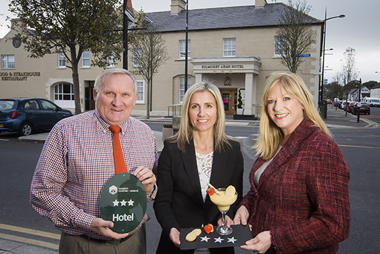 Sam Hamilton & Claire McCauley of Kilmorey Arms receive the Kilmorey Arms’ three star award on its first Quality Grading Assessment from Caroline Adams, Tourism Quality and Standards Manager.