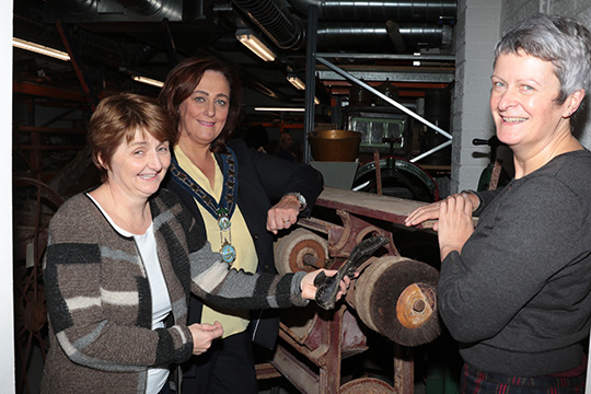 Pictured in Down County Museum in Downpatrick are Peace III co-ordinator Shirley Lennon, Newry Mourne and Down District Council Chairperson Councillor Gillian Fitzpatrick, and Madeleine McCallister, Assistant Keeper of Collections with the Shoe Machine from the former Jewish Refugee Farm at Millisle.