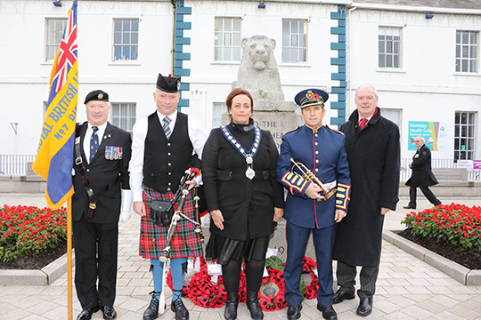 Standard Bearer Andrew McRoberts, Pipe Major Gareth O'Brien, Bessbrook PIpe Band, Chairperson Newry, Mourne and Down District Council Councillor Gillian Ftizpatrick, Bugler George McKee, Kilkeel Silver Band, and Liam Hannaway, Chief Executive of Newry Mourne and Down District Council at the War Memorial in Newcastle where the Centenary Commemorative Service and laying of wreaths took place in remembrance of the Battle of the Somme 1916.