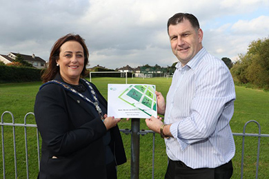 Newry Mourne and Down District Council Chairperson Councillor Gillian Fitzpatrick with Conor Haughey, of the Council’s Regulatory and Technical Services Department launch the sports facility strategy.