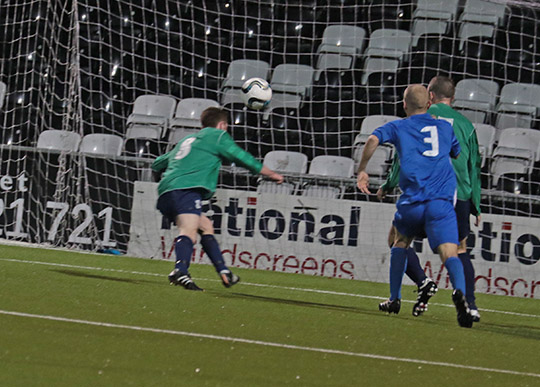Jack McLaughlin heads in his second goal against Immaculata.