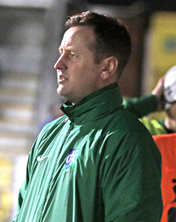 Downpatrick FC Manager Joe McMahon keeps an eye on the run of play against Immaculata.
